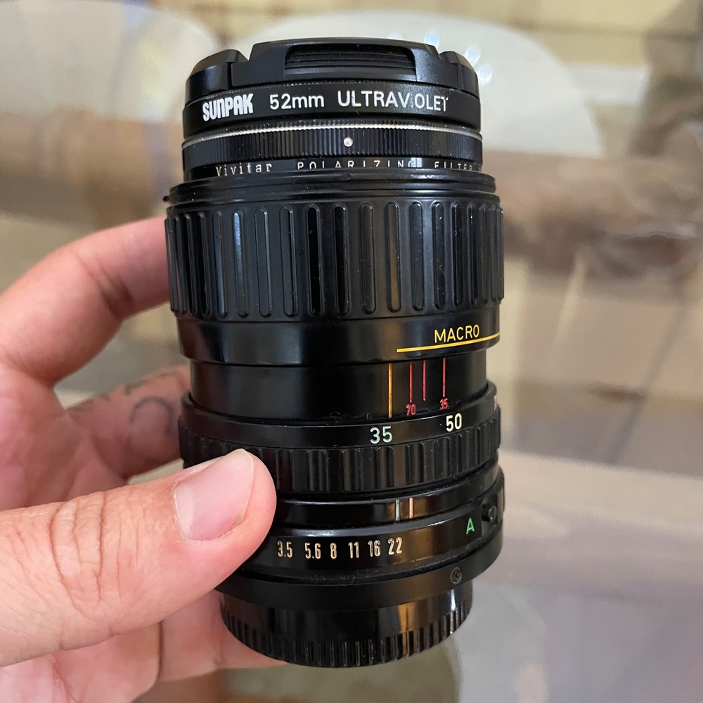 Canon Zoom Lens FD 35-70mm 1:3.5-4.5 Macro Japan with Sunpak Vivitar Filters
